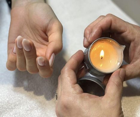 Масажна свічка з ароматом персика Baehr Massagekerze Pfirsich 50 мл - основне фото