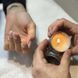 Массажная свеча с ароматом сандалового масла Baehr Bio-Massagekerze Sandelholz-Orangenblute 50 мл - дополнительное фото
